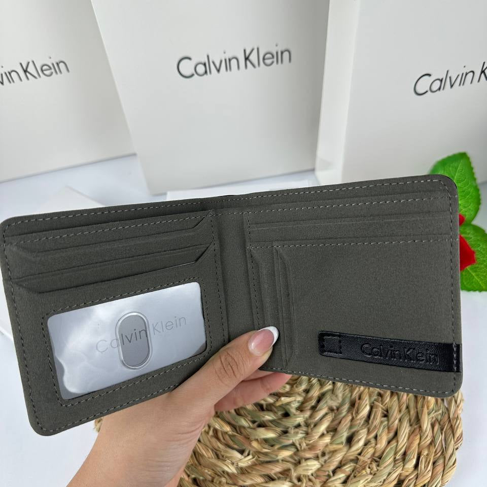 Calvin Klein Men's Black Leather Bi-Fold Wallet with Embossed Logo 🖤✨💳
