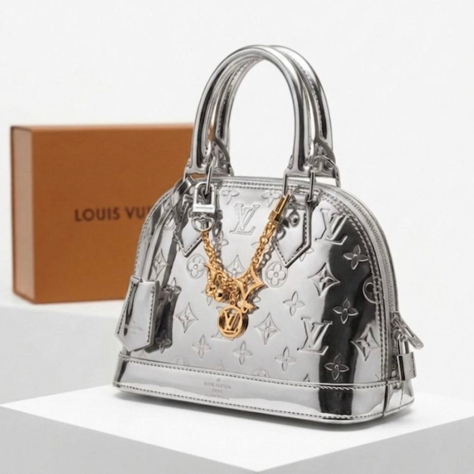 Louis Vuitton Alma Metallic Handbag with Monogram Chain 👜✨💎