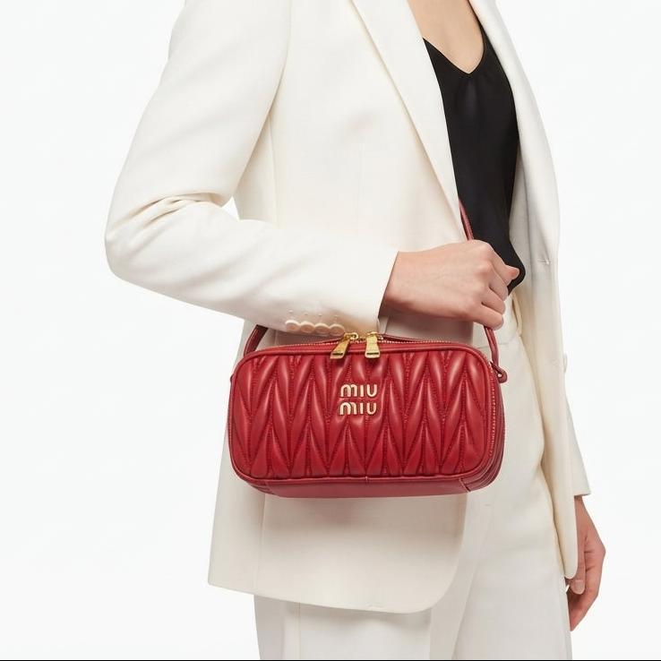Miu Miu Quilted Leather Bag with Gold Tone Hardware