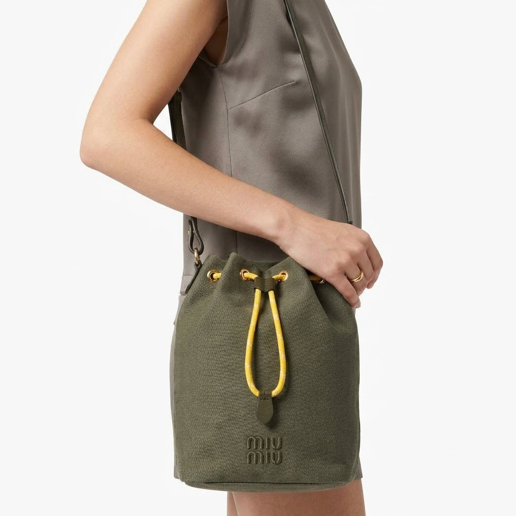 Miu Miu Canvas Drawstring Bucket Bag in Olive Green