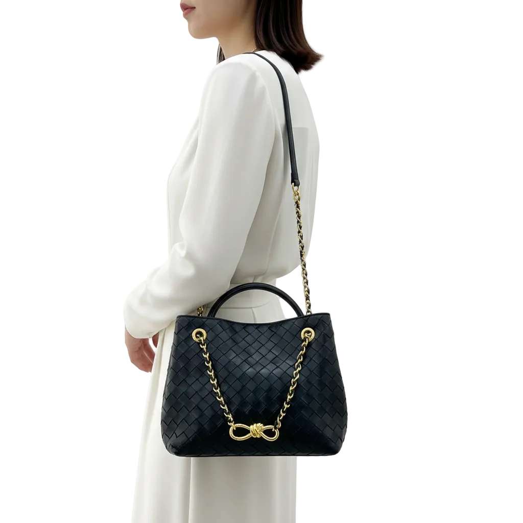 👜 Black Woven Leather Handbag with Gold Chain Detail ✨🔗
