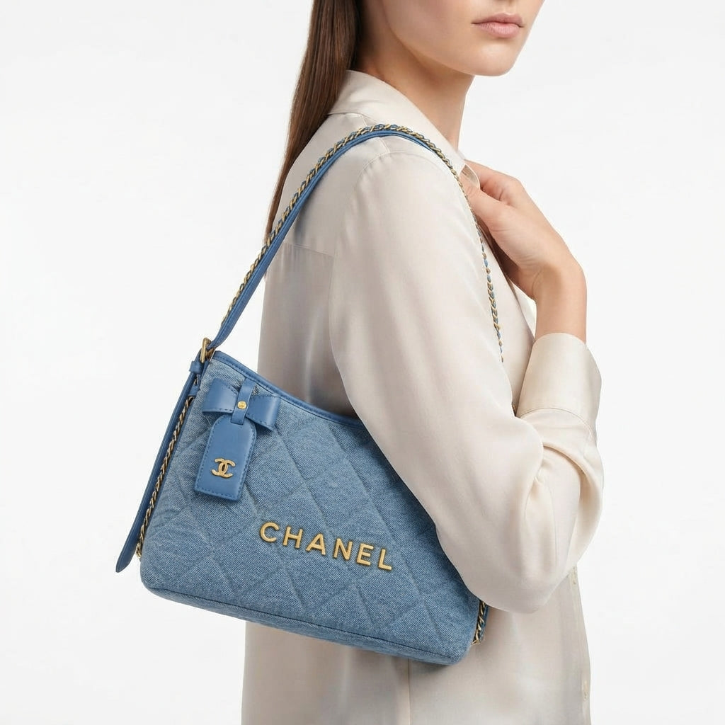 Chanel Quilted Denim Shoulder Bag with Gold Tone Bow Detail