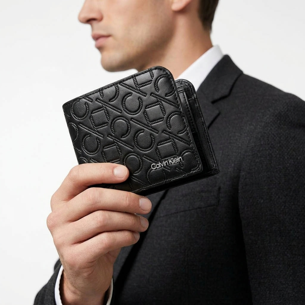 Calvin Klein Monogram Embossed Leather Billfold Wallet