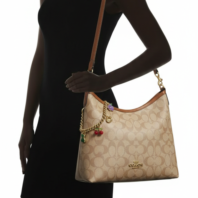 Coach Signature Canvas Hobo Bag with Playful Charms 👜🍒✨