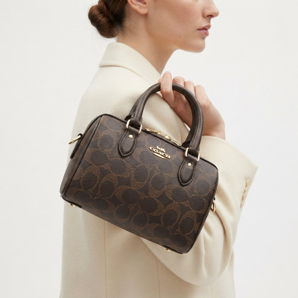 Coach Brown Monogram Mini Bag with Heart Charm