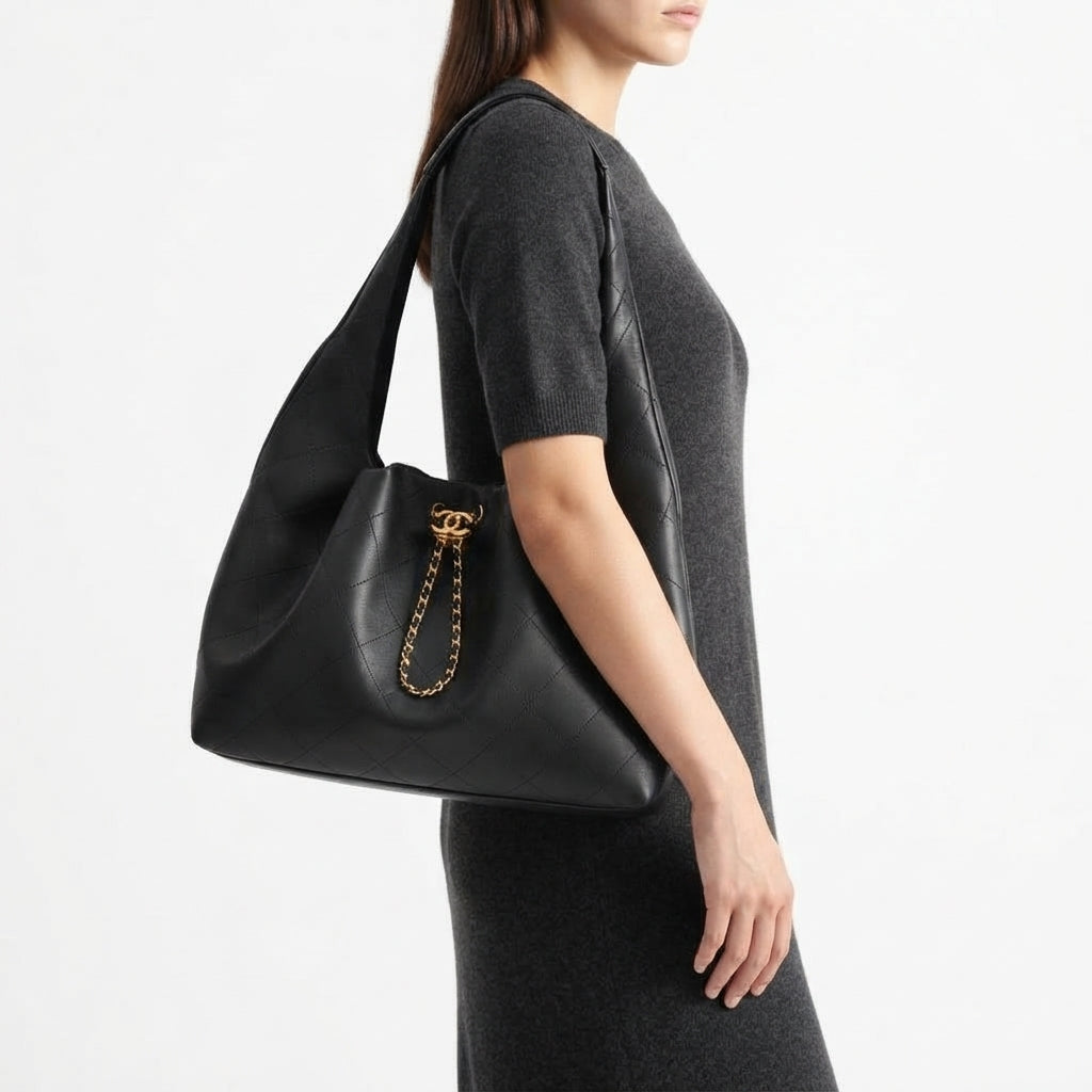 Chanel Quilted Leather Hobo Bag with Gold Chain Detail