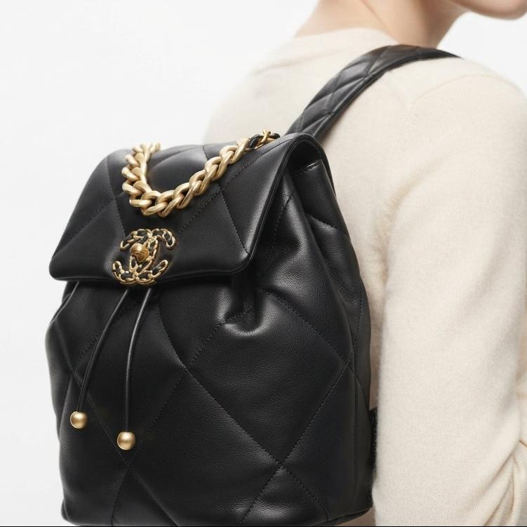 Chanel Quilted Leather Backpack with Gold Tone Hardware