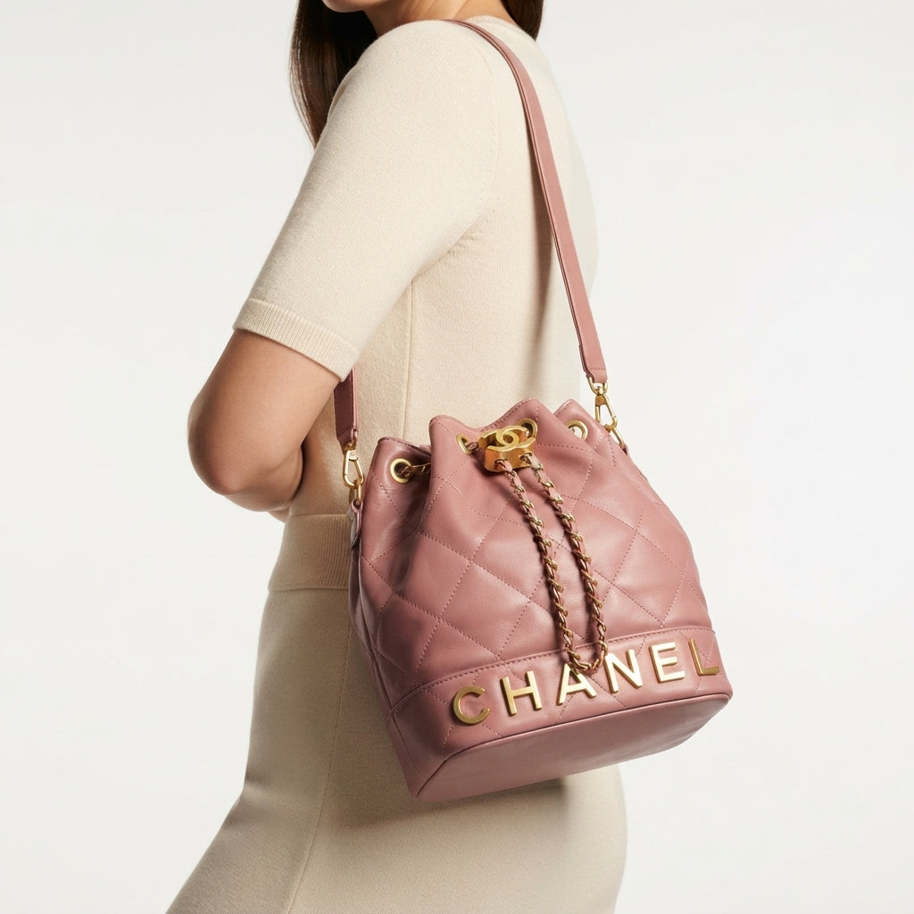Chanel Quilted White Bucket Bag with Gold Chain Detail
