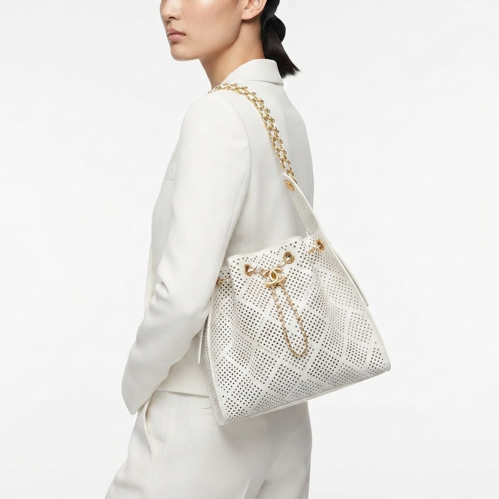 Chanel Perforated Leather Bucket Bag with Gold Chain