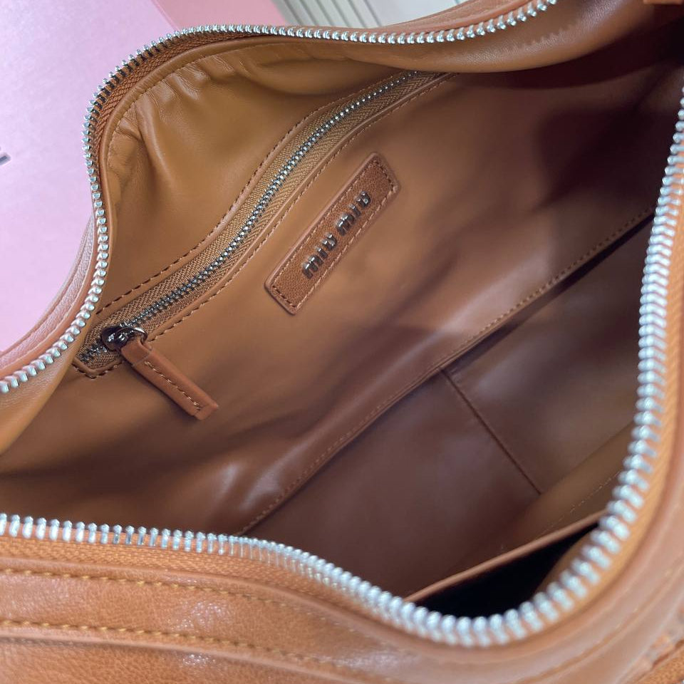 Miu Miu: Chic Brown Hobo Bag 👜🤎