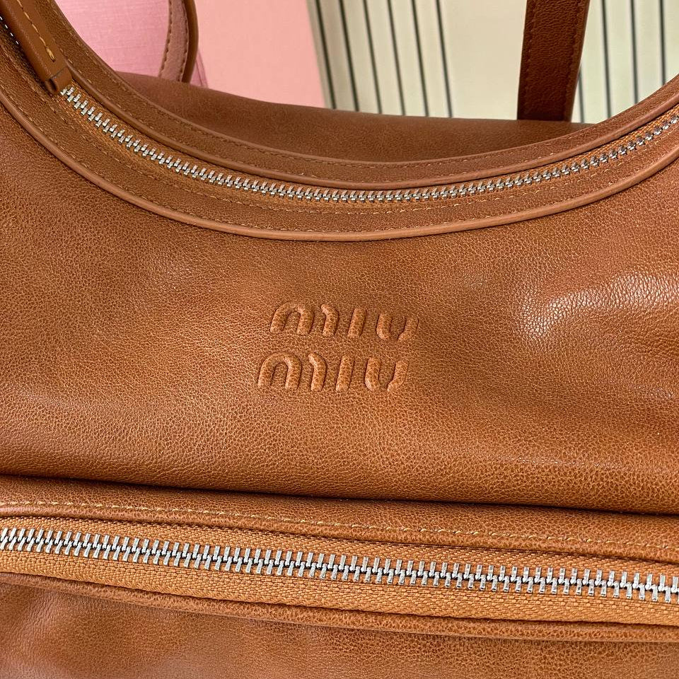 Miu Miu: Chic Brown Hobo Bag 👜🤎