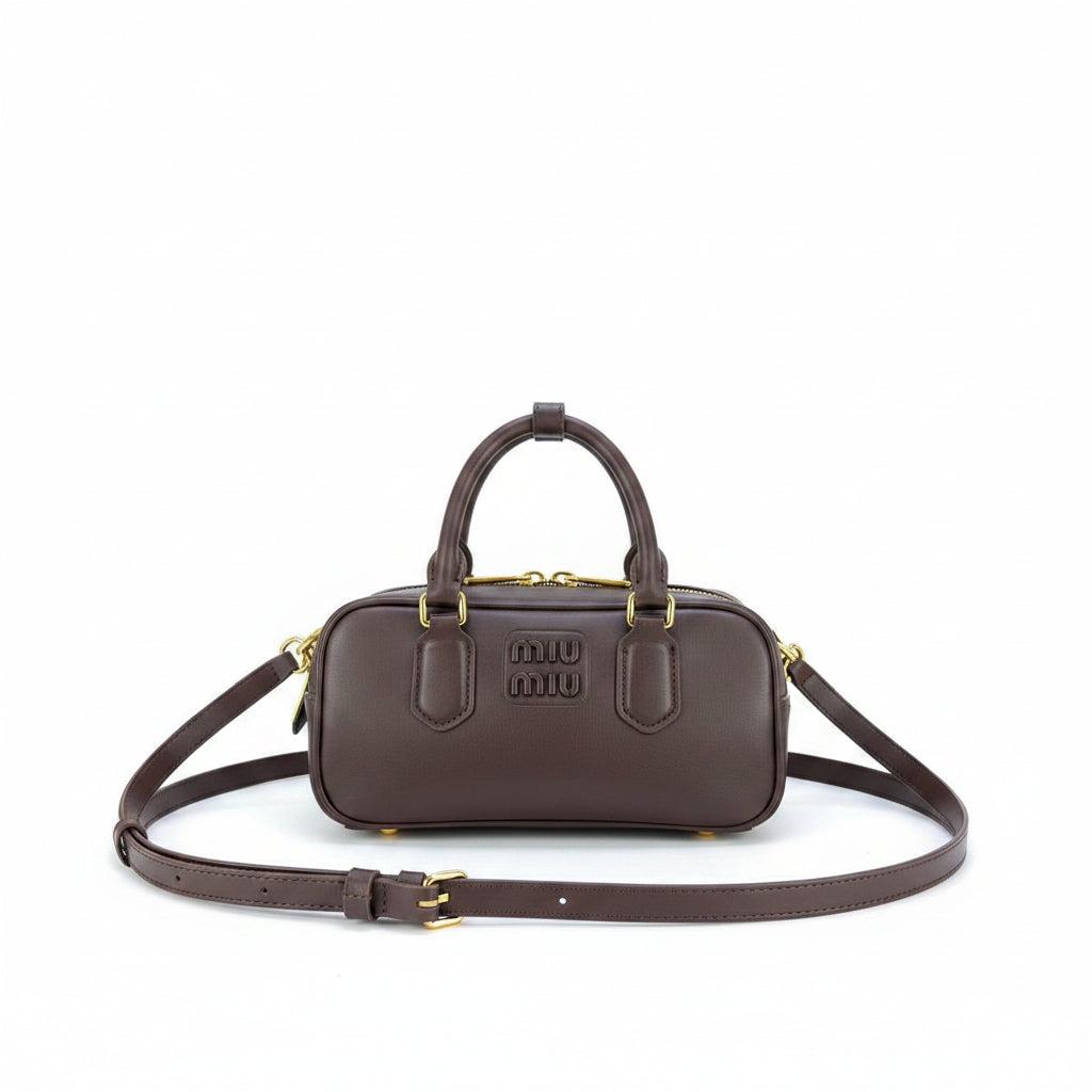 Miu Miu Signature Brown Leather Handbag with Playful Charms 👜✨