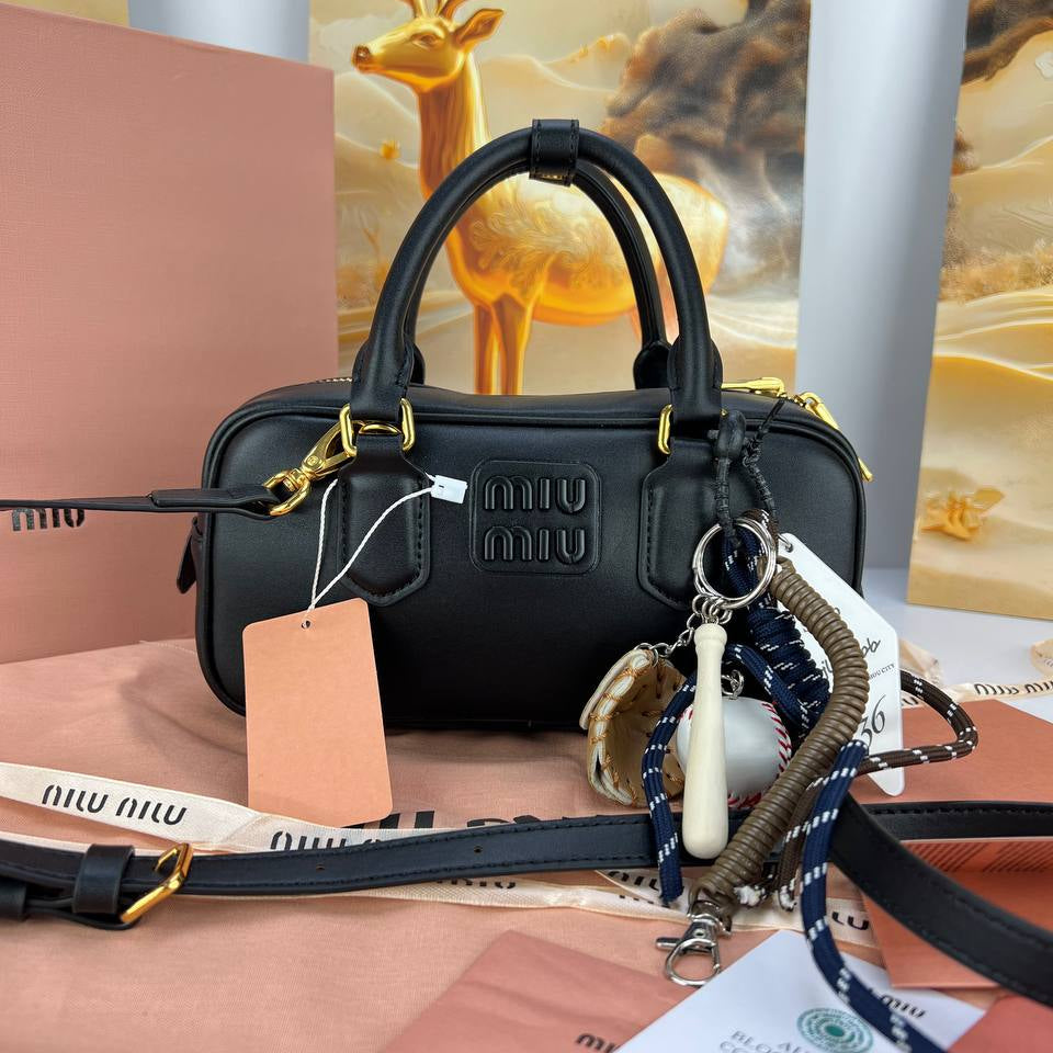 Miu Miu Signature Brown Leather Handbag with Playful Charms 👜✨