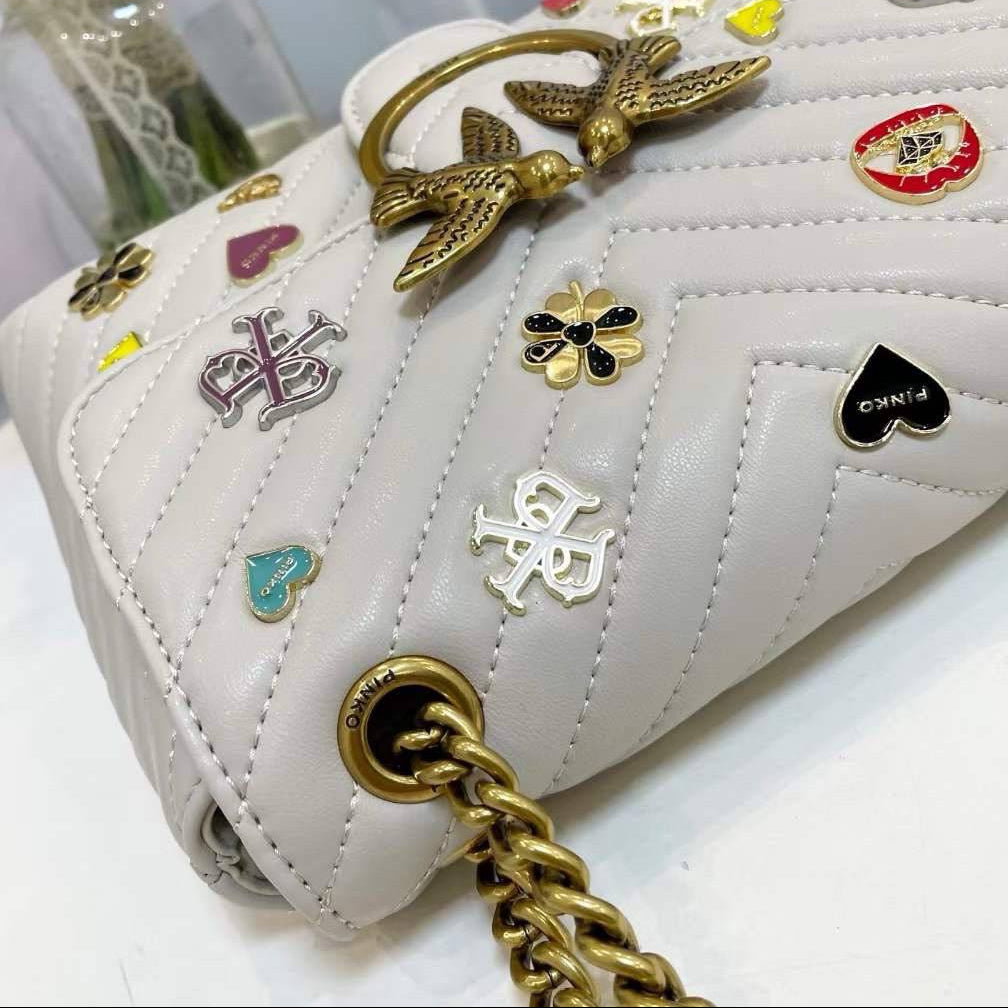 Pinko Quilted Crossbody Bag with Playful Pin Embellishments 🕊️✨