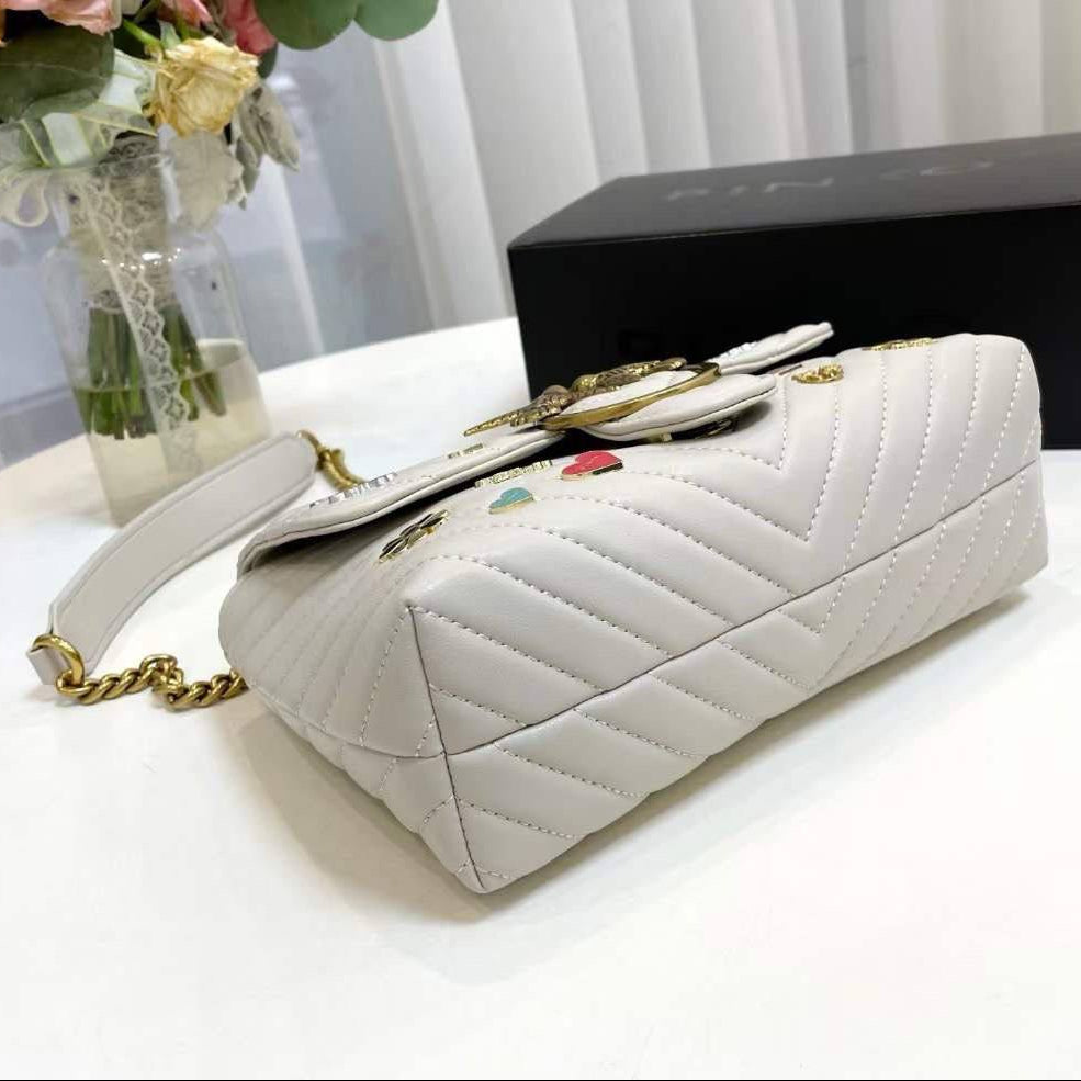 Pinko Quilted Crossbody Bag with Playful Pin Embellishments 🕊️✨