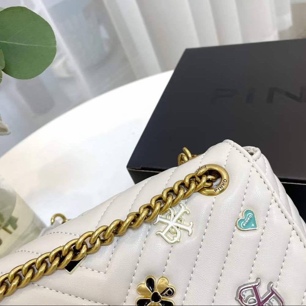 Pinko Quilted Crossbody Bag with Playful Pin Embellishments 🕊️✨