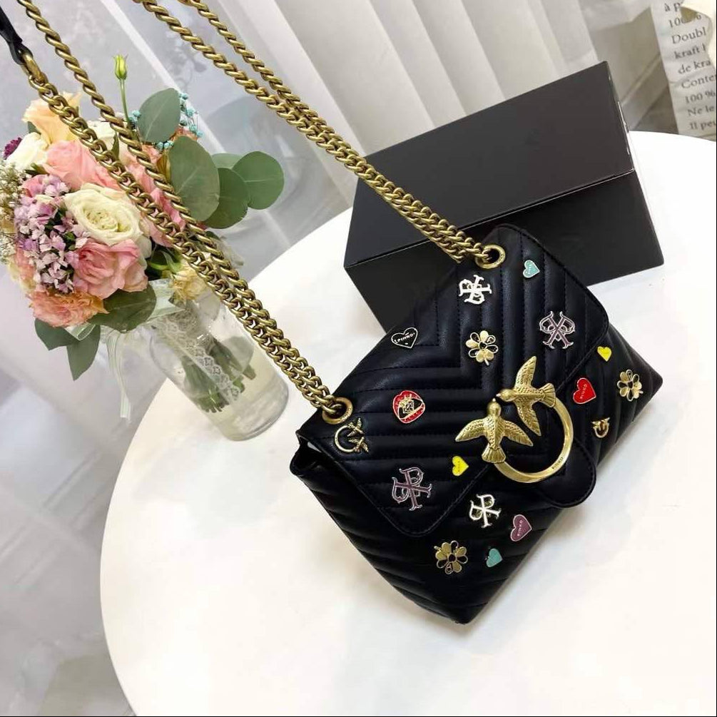 Pinko Quilted Crossbody Bag with Playful Pin Embellishments 🕊️✨