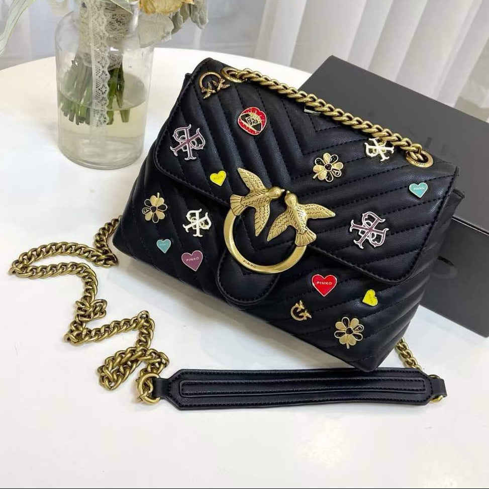 Pinko Quilted Crossbody Bag with Playful Pin Embellishments 🕊️✨