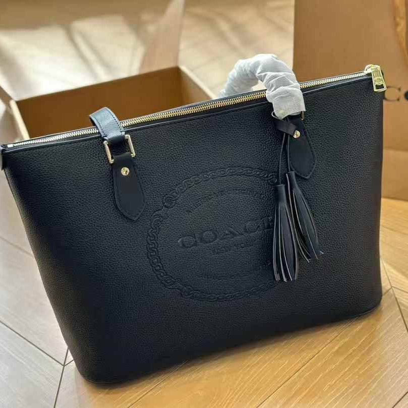 Coach Signature Embossed PVC City Tote with Tassel Detail