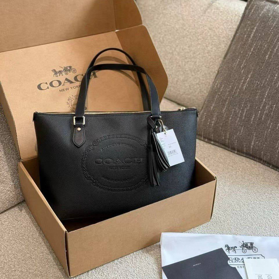 Coach Signature Embossed PVC City Tote with Tassel Detail