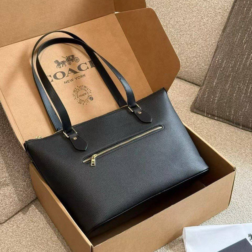 Coach Signature Embossed PVC City Tote with Tassel Detail
