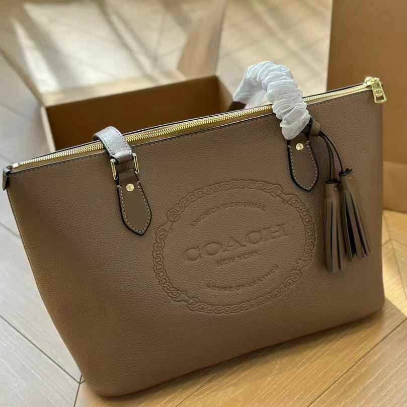 Coach Signature Embossed PVC City Tote with Tassel Detail