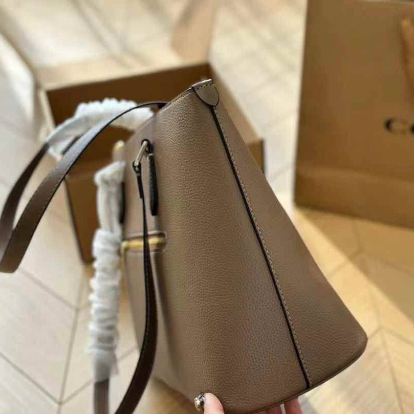 Coach Signature Embossed PVC City Tote with Tassel Detail