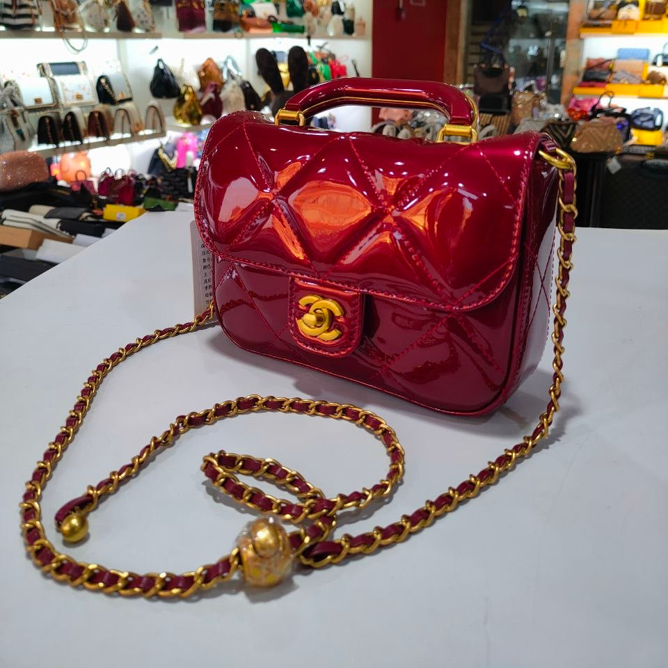 Quilted Patent Leather Top Handle Bag with Gold-Tone Chain