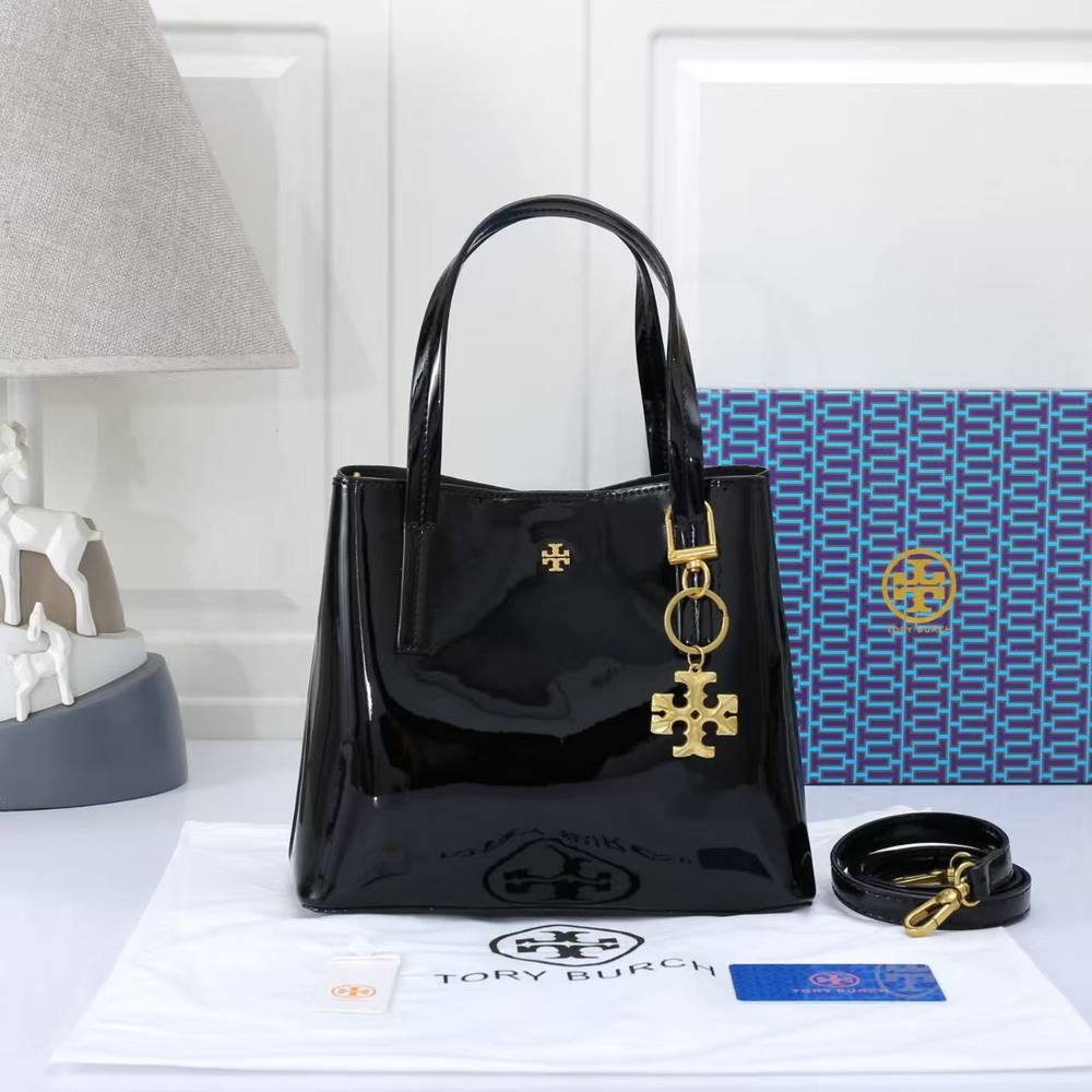 Tory Burch Patent Leather Handbag with Gold Tone Logo Charm