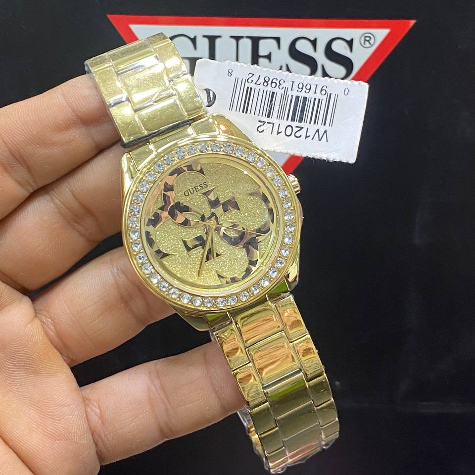 Guess Gold Tone Crystal Bezel Animal Print Dial Watch