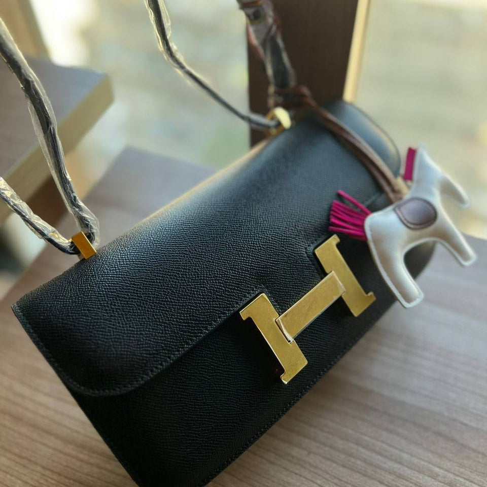 Elegant H-Clasp Shoulder Bag with Scarf Handle and Horse Charm