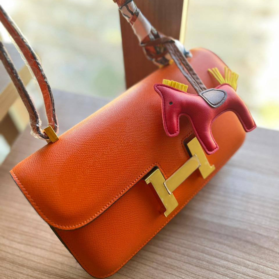 Elegant H-Clasp Shoulder Bag with Scarf Handle and Horse Charm