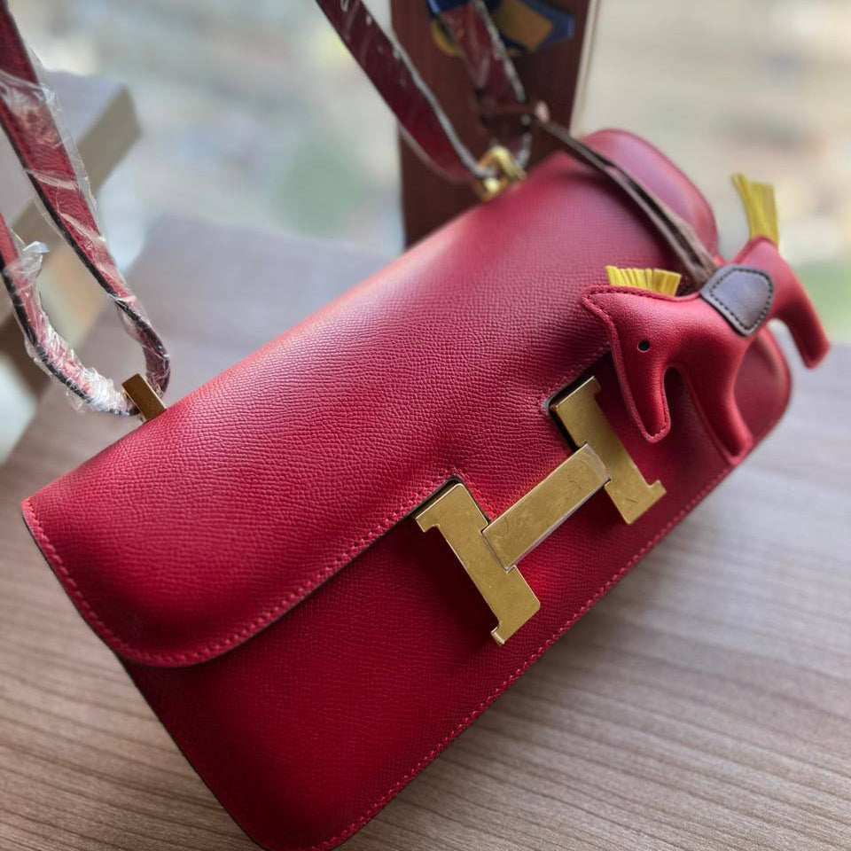 Elegant H-Clasp Shoulder Bag with Scarf Handle and Horse Charm