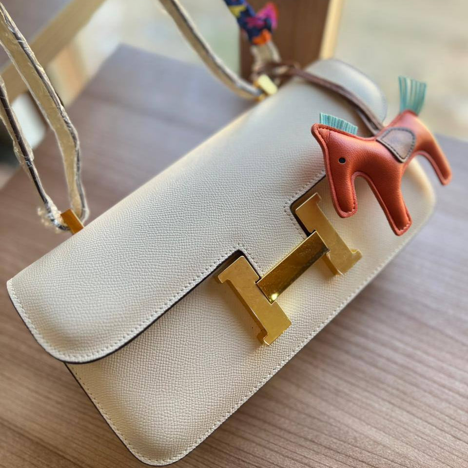 Elegant H-Clasp Shoulder Bag with Scarf Handle and Horse Charm