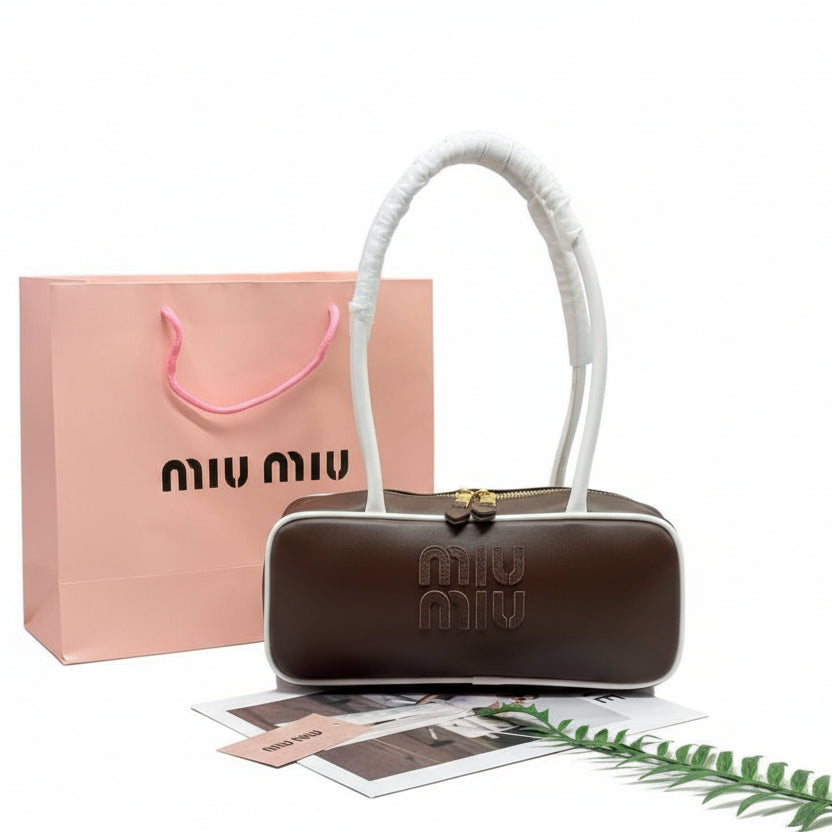 Miu Miu Leather Cylinder Bowling Bag with Contrast Piping 👜🍫✨