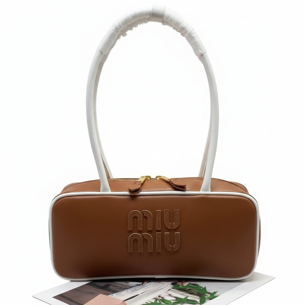 Miu Miu Leather Cylinder Bowling Bag with Contrast Piping 👜🍫✨