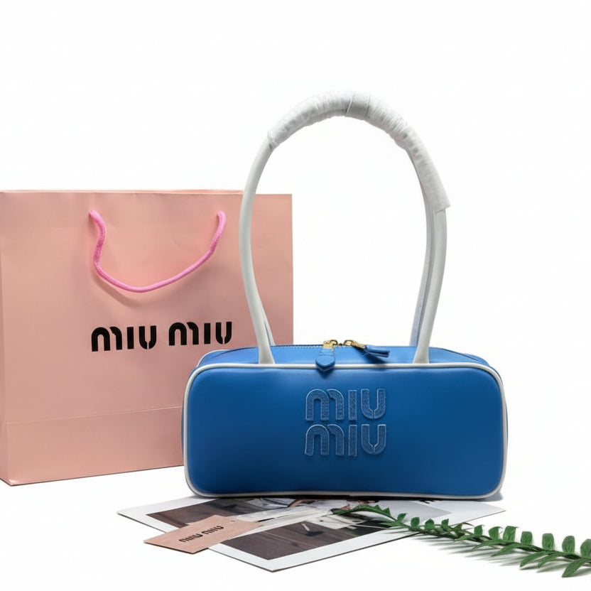 Miu Miu Leather Cylinder Bowling Bag with Contrast Piping 👜🍫✨