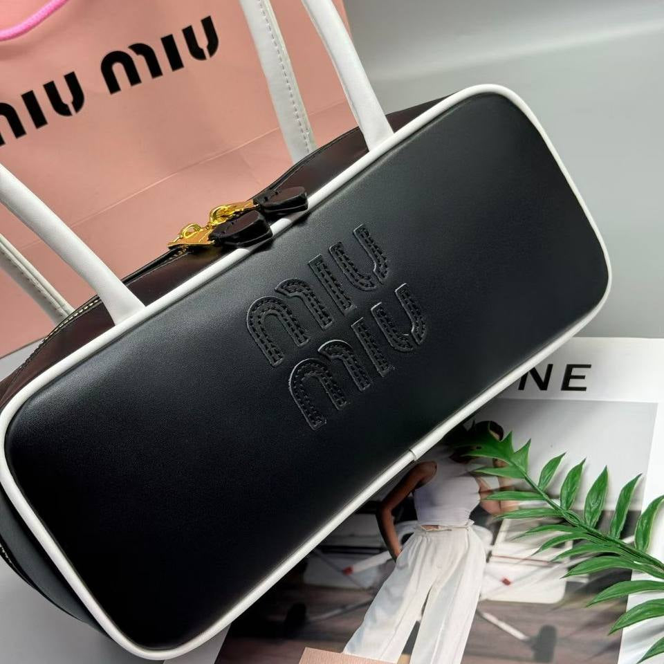 Miu Miu Leather Cylinder Bowling Bag with Contrast Piping 👜🍫✨