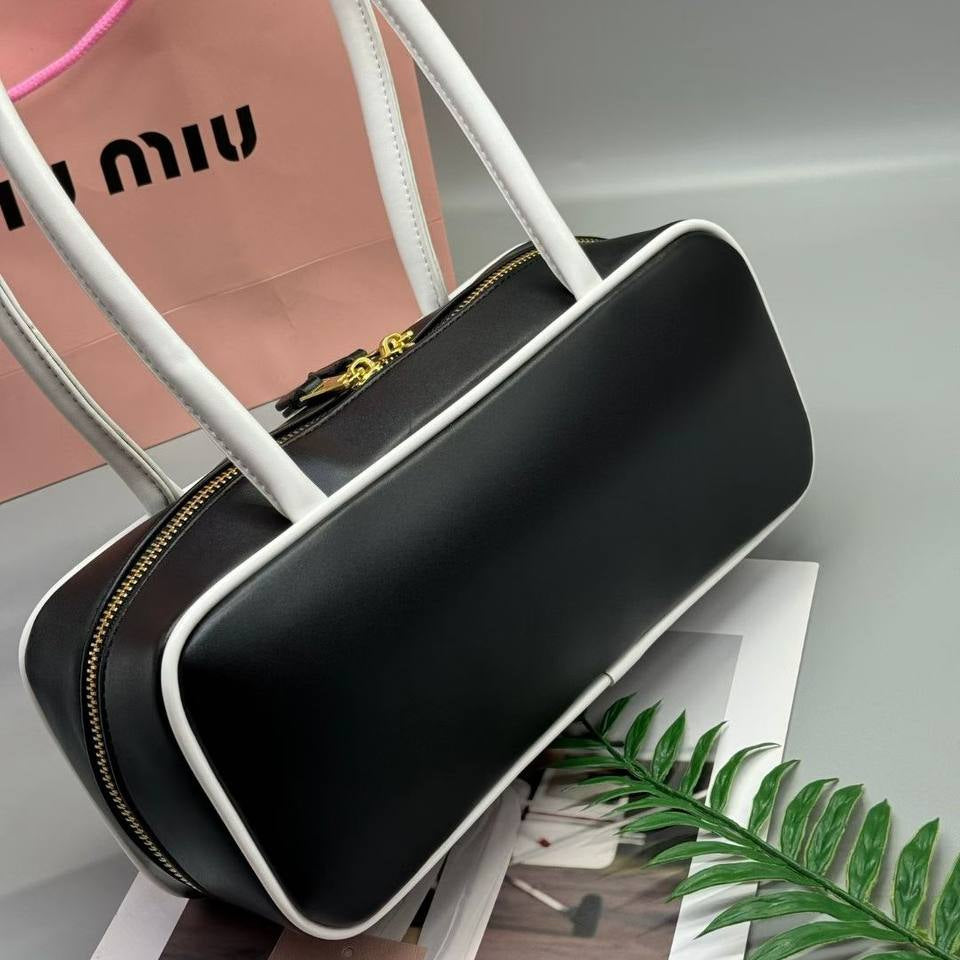 Miu Miu Leather Cylinder Bowling Bag with Contrast Piping 👜🍫✨