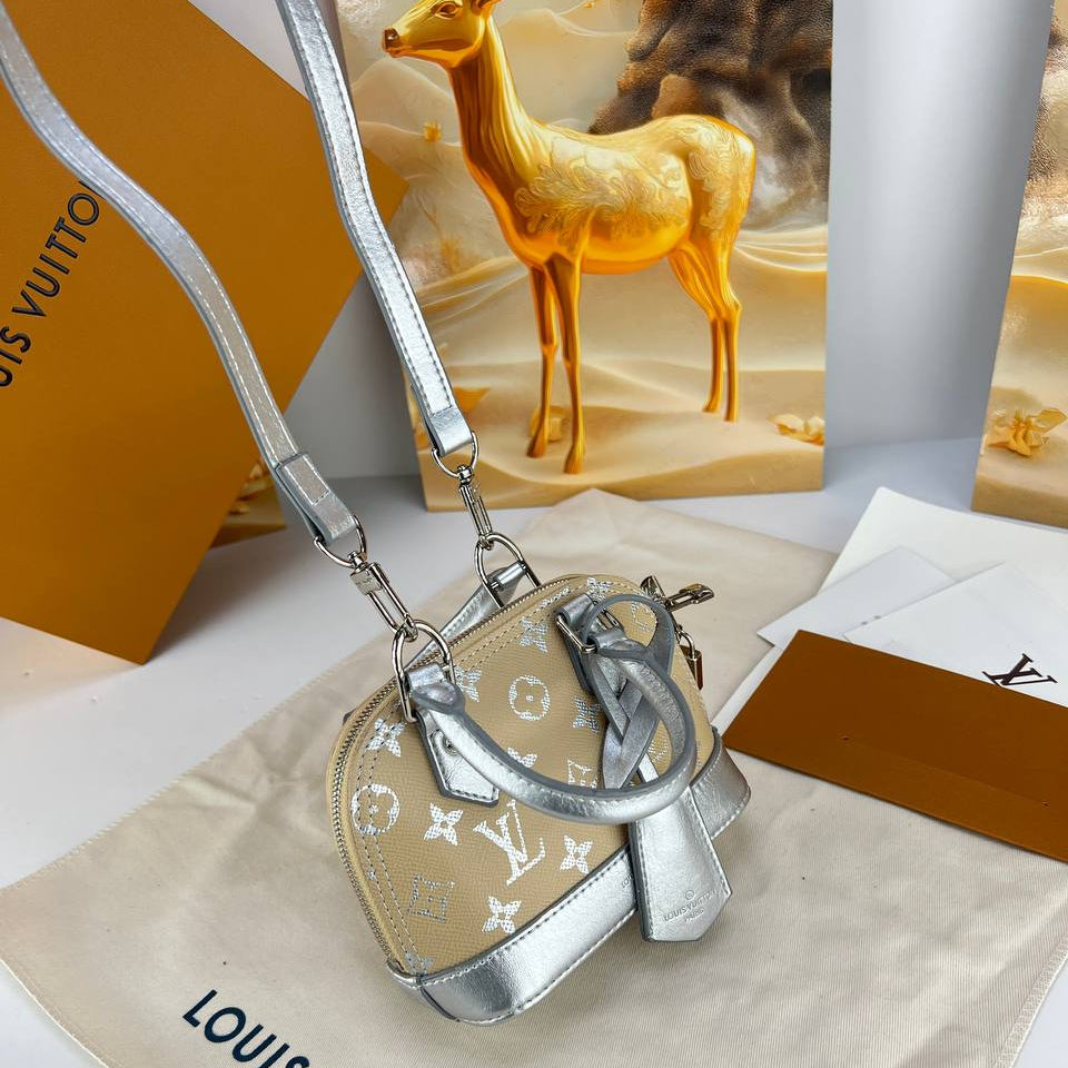 Louis Vuitton Alma Nano Monogram Bag with Silver Metallic Trim