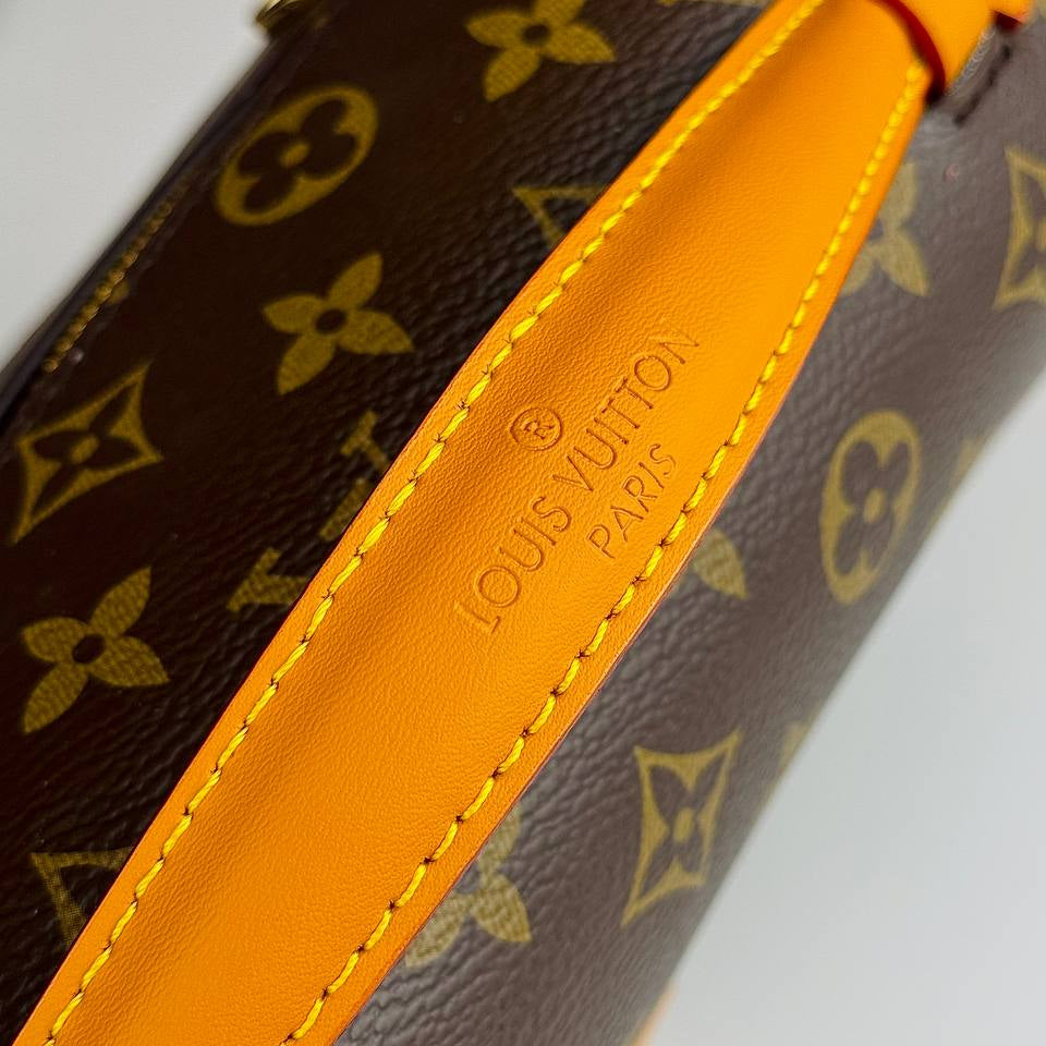 Louis Vuitton Monogram Satchel with Vibrant Orange Accents