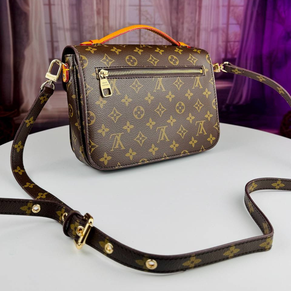 Louis Vuitton Monogram Satchel with Vibrant Orange Accents
