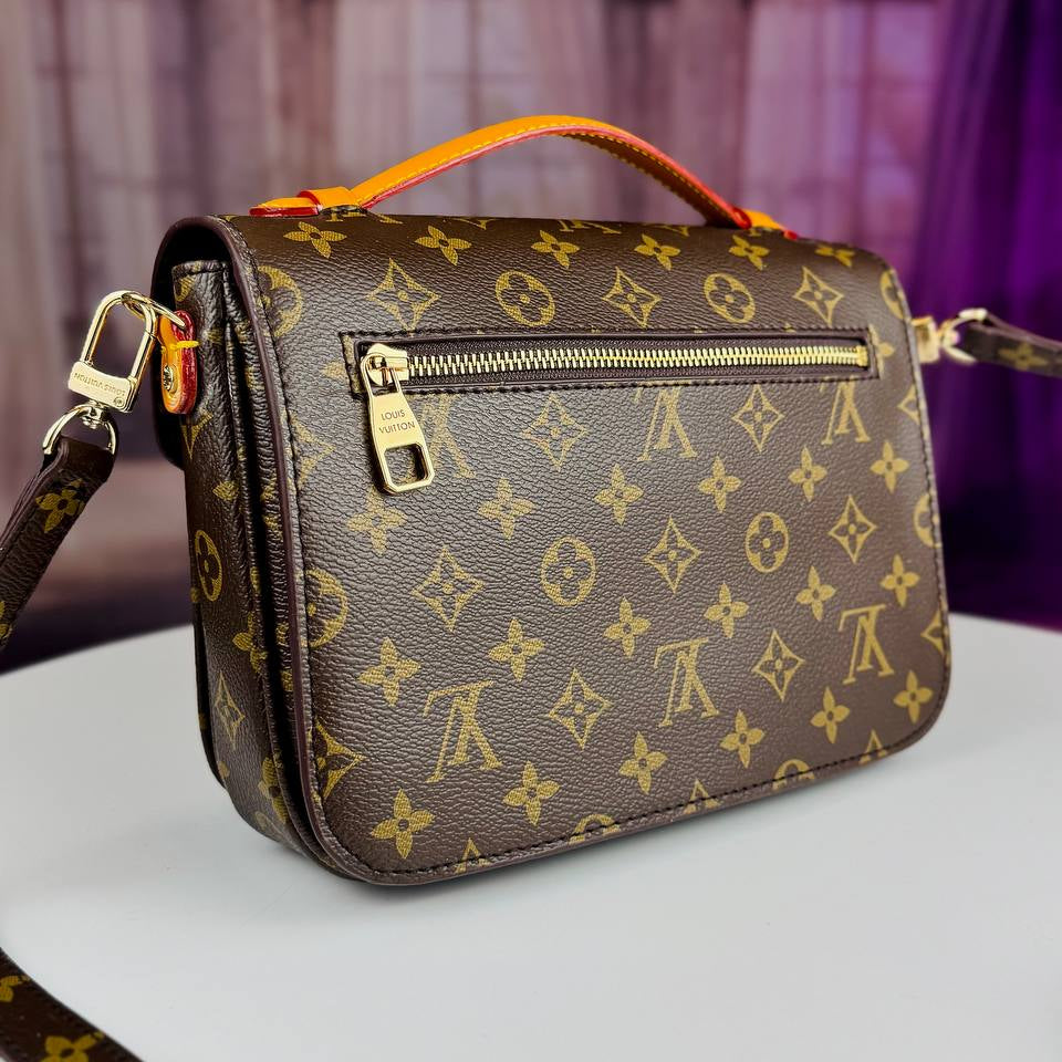 Louis Vuitton Monogram Satchel with Vibrant Orange Accents
