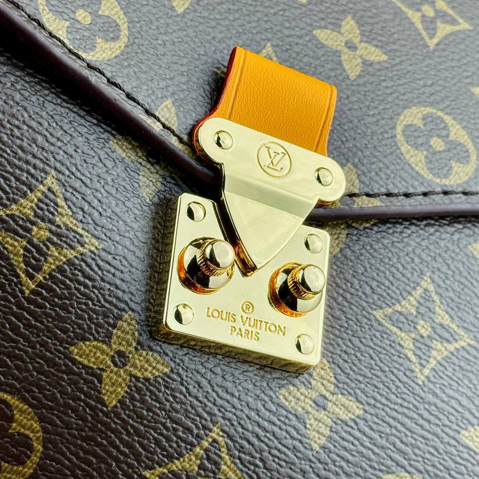 Louis Vuitton Monogram Satchel with Vibrant Orange Accents