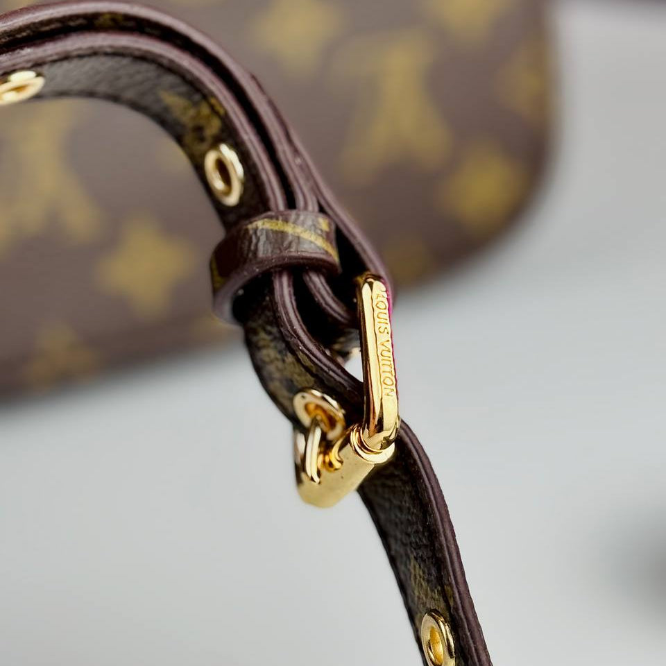 Louis Vuitton Monogram Satchel with Vibrant Orange Accents