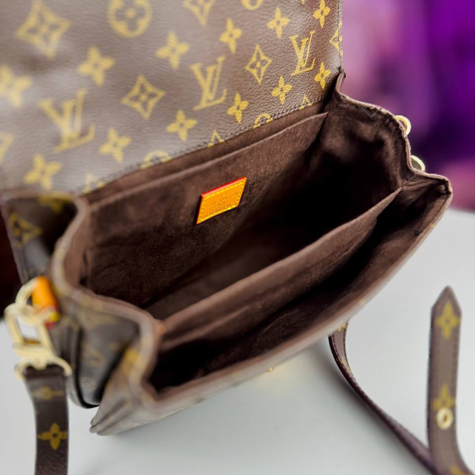 Louis Vuitton Monogram Satchel with Vibrant Orange Accents