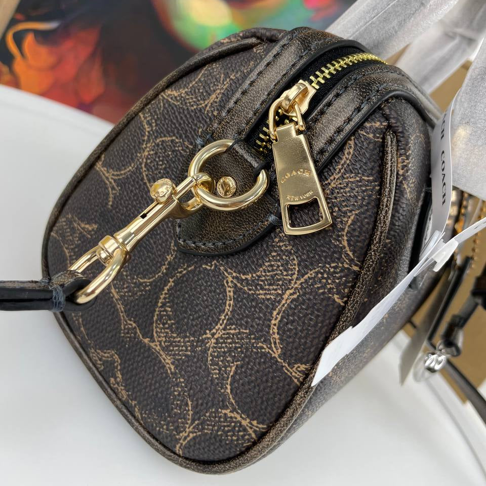 Coach Brown Monogram Mini Bag with Heart Charm