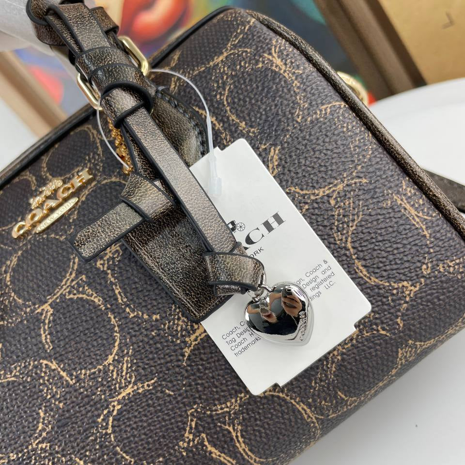 Coach Brown Monogram Mini Bag with Heart Charm