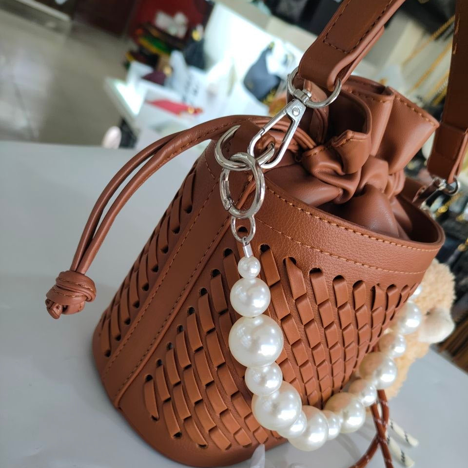 Woven Faux Leather Bucket Bag with Pearl Handle