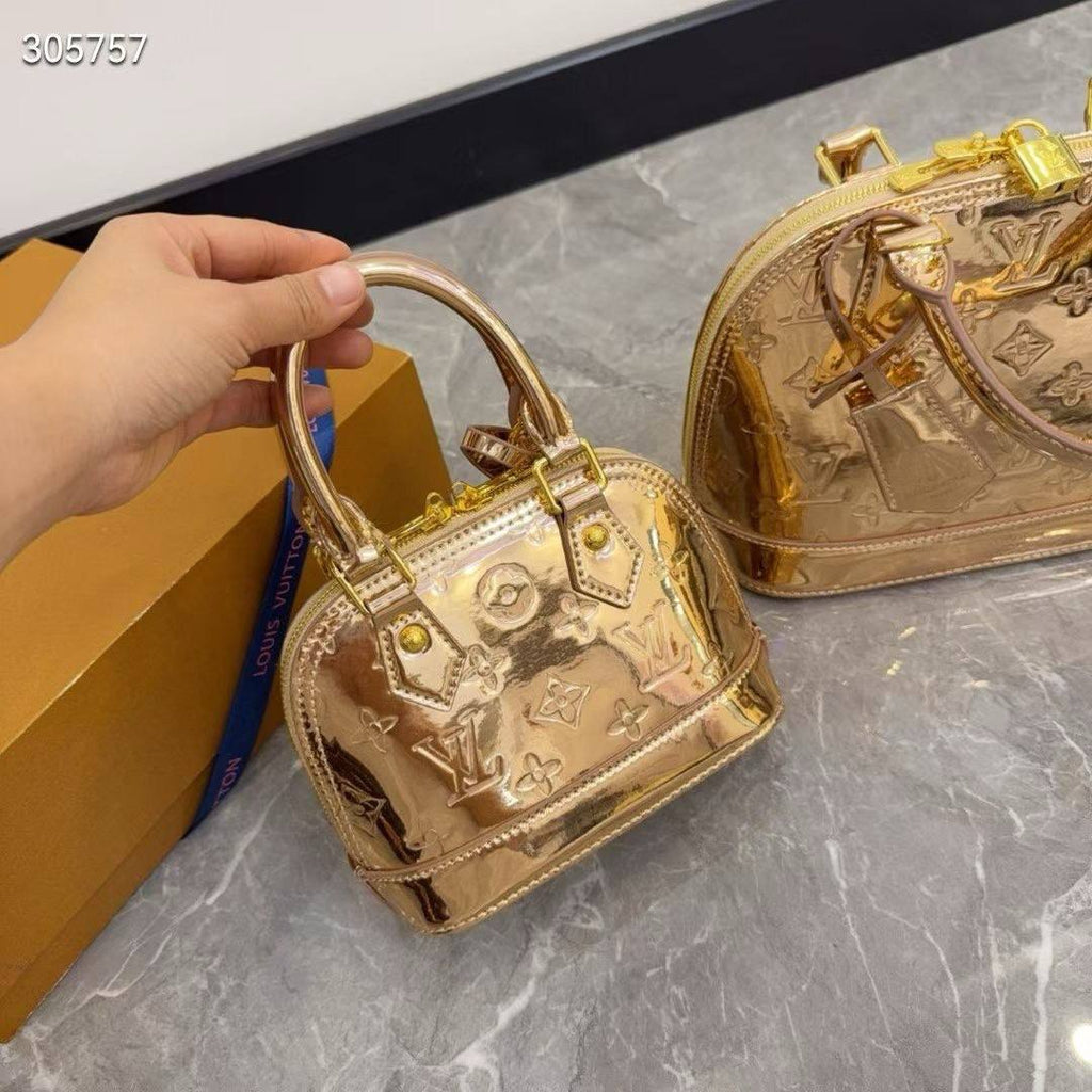 Louis Vuitton Metallic Gold Patent Alma Bag